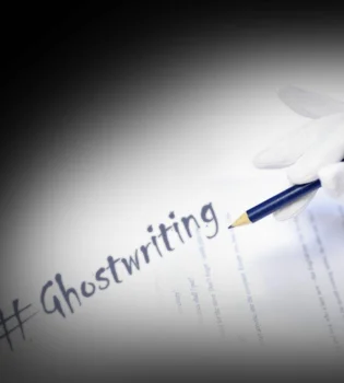 The ghost content writing services are displayed by a gloved hand writing in pencil on a paper