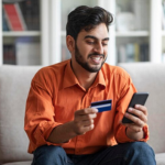 A man completes the transaction procedure by paying with a credit card through her phone